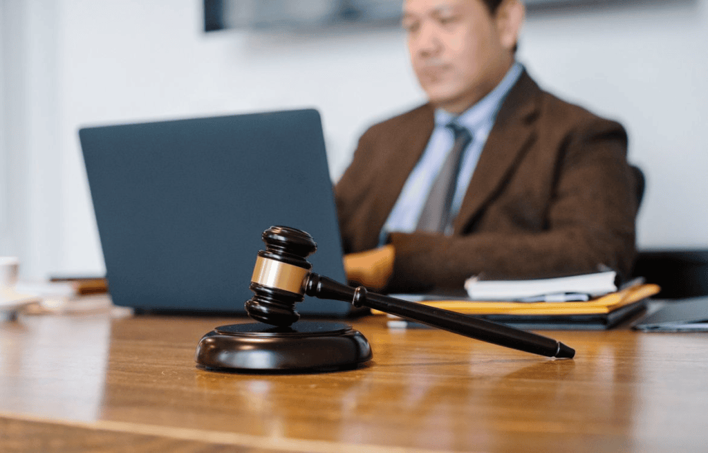 Attorney using AI-powered legal technology for research and document review.
