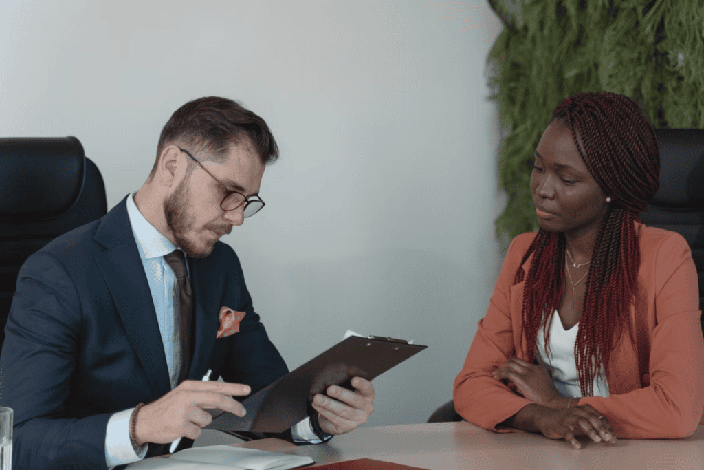 man reviewing womans resume